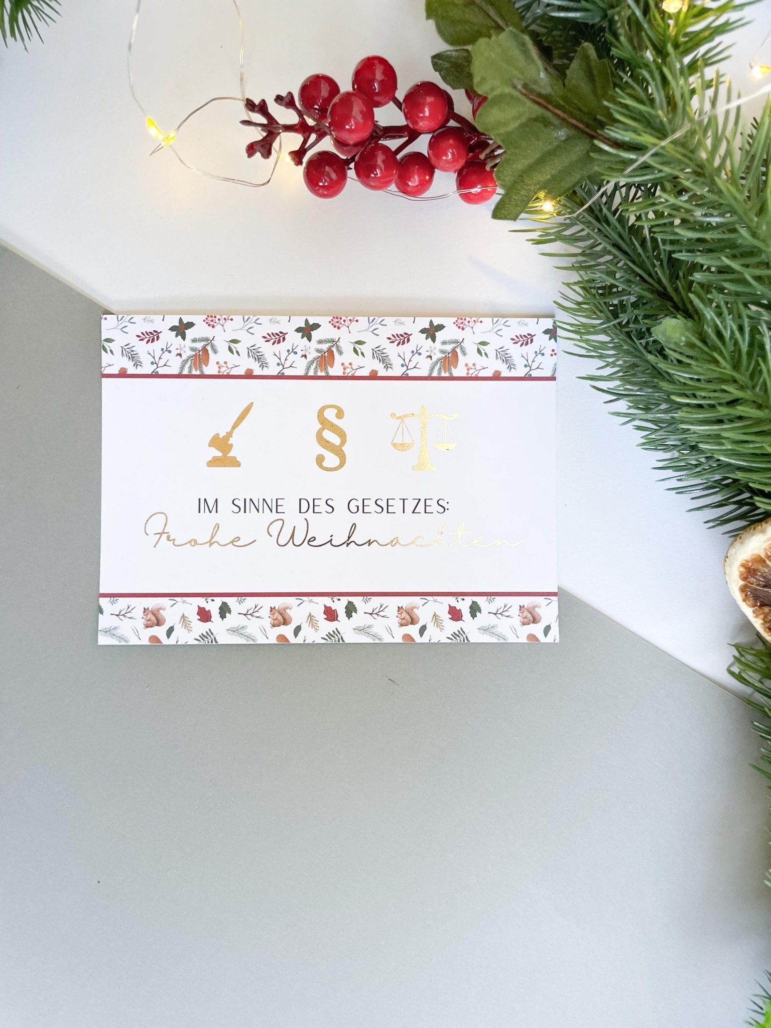 Christmas card – with legal symbols, paragraph sign, scales of justice, gift for jurists.