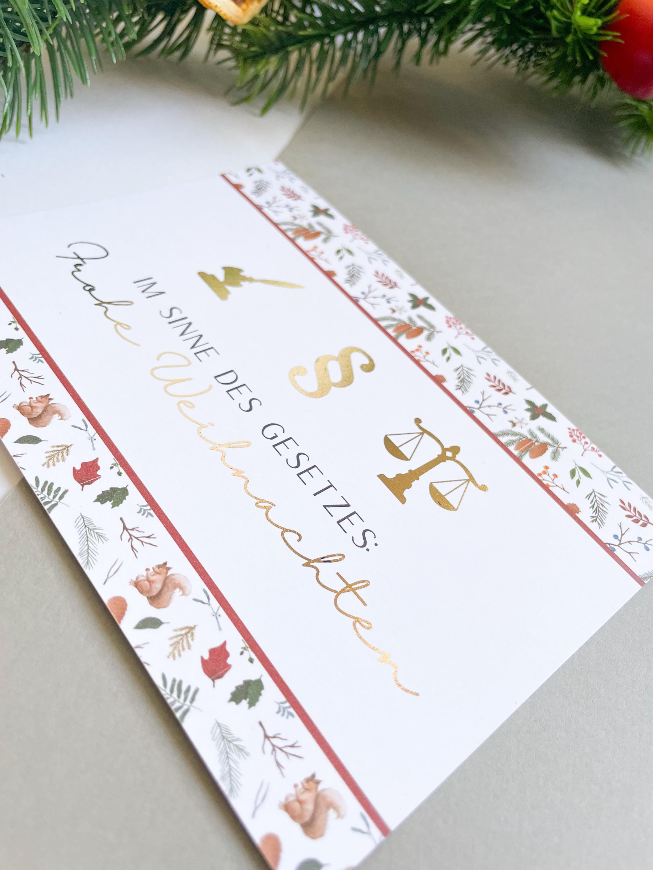 Christmas card – with legal symbols, paragraph sign, scales of justice, gift for jurists.