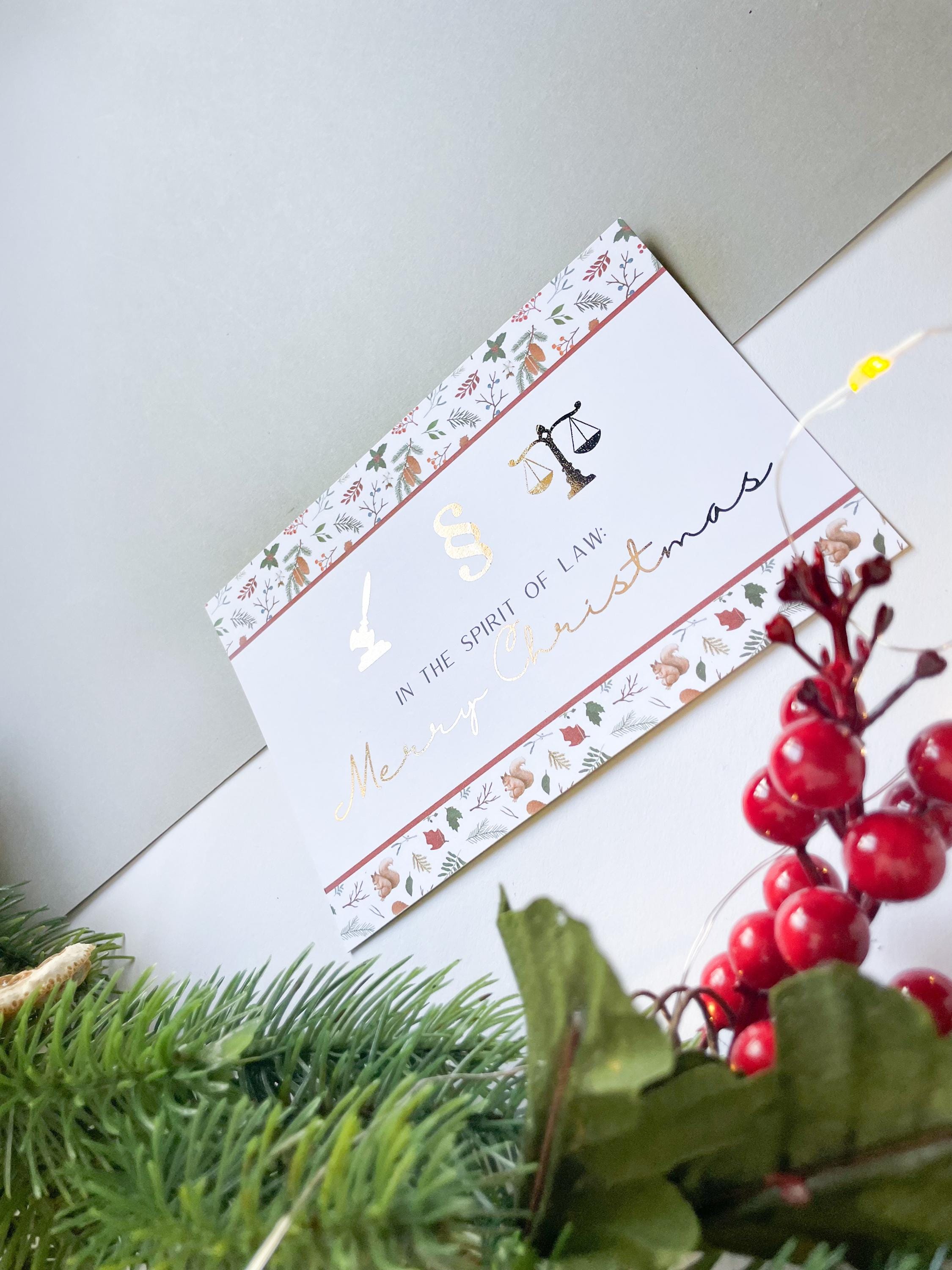 Christmas card – with legal symbols, paragraph sign, scales of justice, gift for jurists.