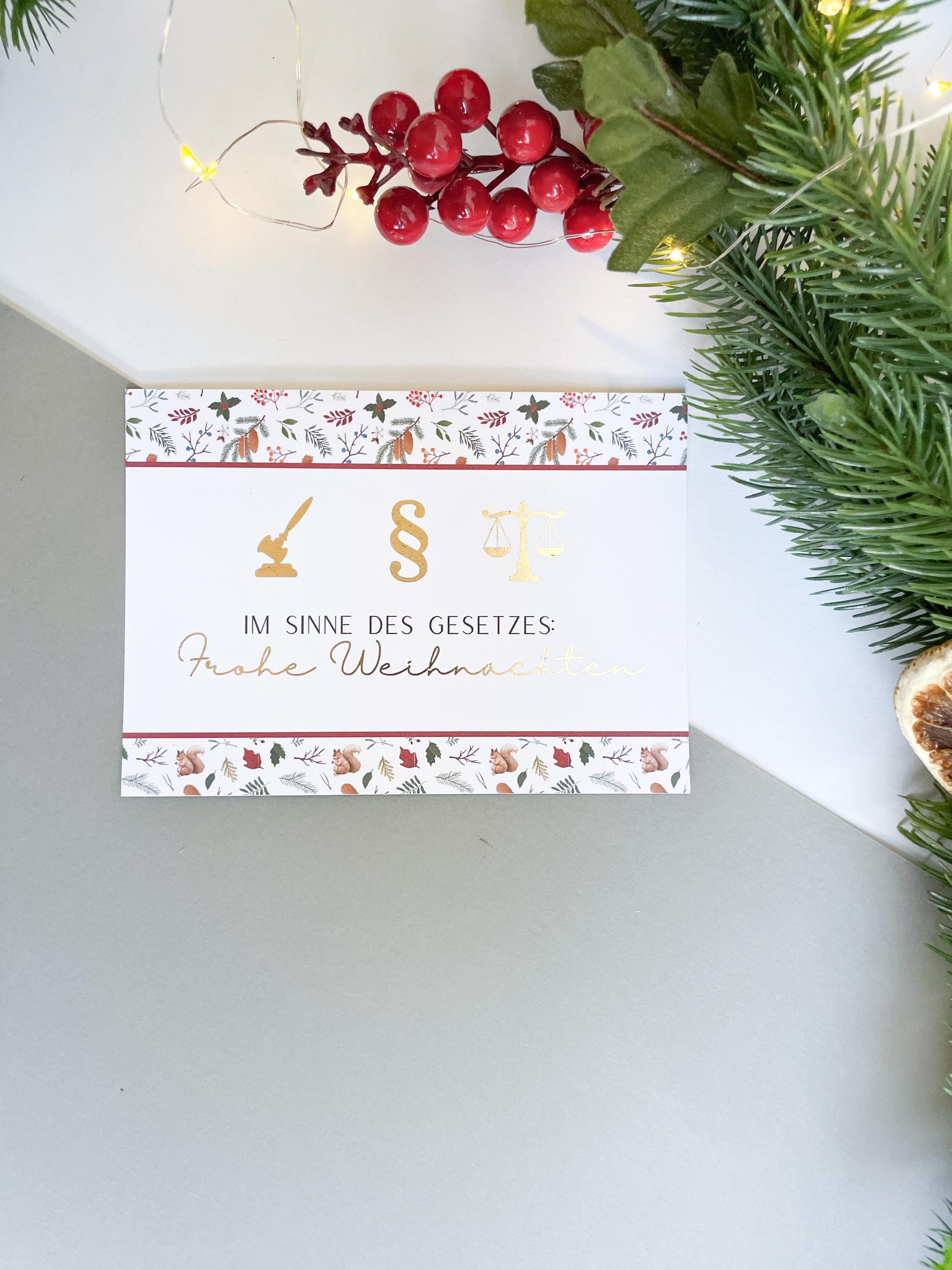 Christmas card – with legal symbols, paragraph sign, scales of justice, gift for jurists.
