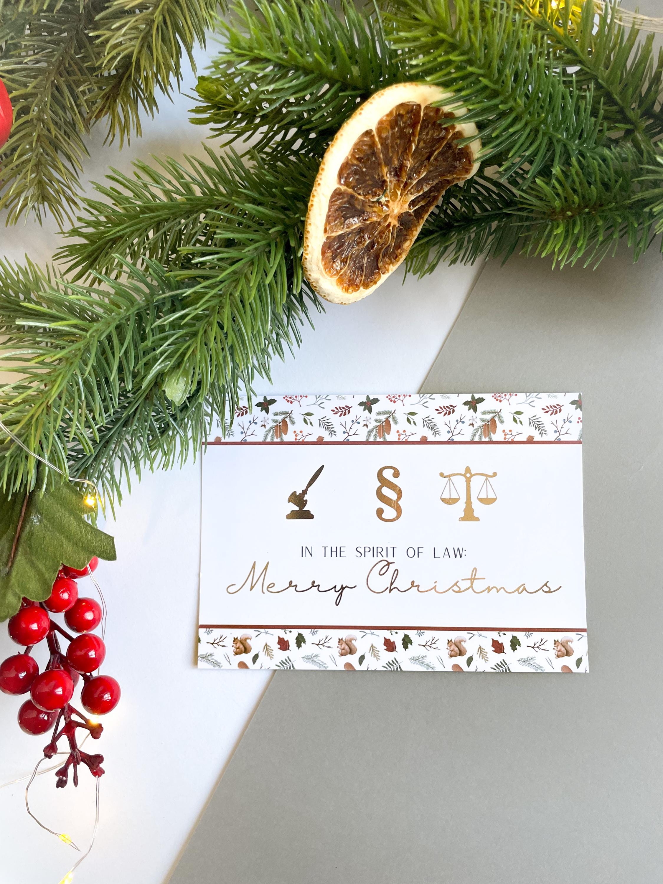 Christmas card – with legal symbols, paragraph sign, scales of justice, gift for jurists.